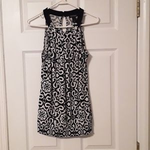 Black and white sleeveless dress top